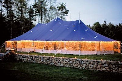 Sperry Tents’ Signature Blue Star Tent is handcrafted with genuine navy sailcloth panels dotted with white stars by sailmakers in coastal Massachusetts. It sports geometric support patches and festive pennant flags atop each peak. Support poles are wooden and hand-milled at a 1930s sawmill. The tent is available in six sizes: The largest, at 46 by 85 feet, holds 150 guests for a seated dinner. Prices are available upon request.