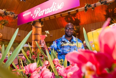 Meetinghouse Companies provided the tiki-style bar, which had a large sign that read 'Welcome to Paradise.' Frost designed a warm, vibrant lighting scheme that gave the space a sunny feel.