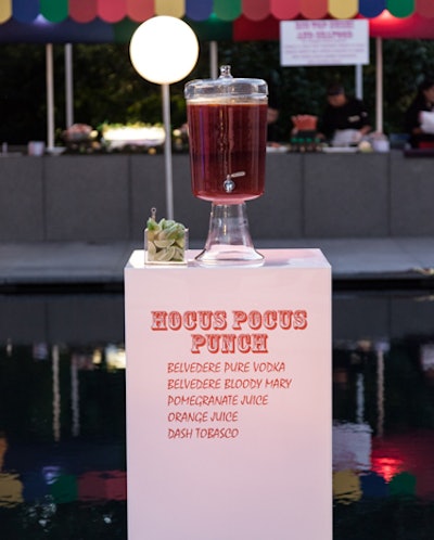 Several featured cocktails were served atop white glass columns that were lit underneath with LED lights. The ingredients were printed on the front of the columns, and the napkins had the exact recipe.