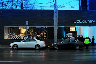 Planners removed the venue's front windows in order to ramp in a display vehicle.