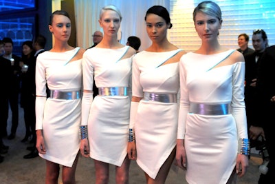 Four models wore custom VAWK dresses that were created for the event by designer Sunny Fong. In keeping with the futuristic theme, Candice & Alison asked the designer to sew the dresses with LED-lit EL wire. Each model had a mini-battery pack on the back of her belt, which powered the EL-wire trimming on the dresses.
