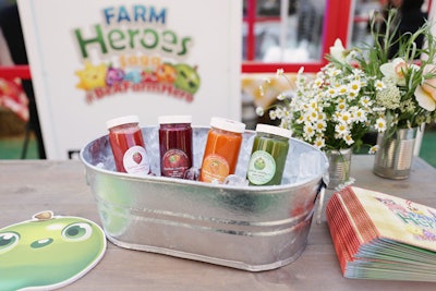 HeartBeet Juicery served cold-pressed juices in bottles with Farm Heroes logos.
