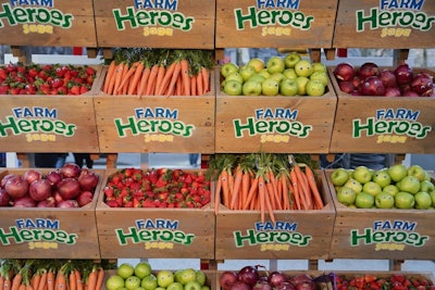 Crates of colorful, fresh produce provided a tactile and on-theme photo backdrop. After the event, the produce was donated to a local food bank.