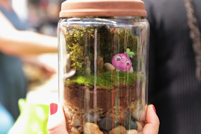 The terrariums contained mini versions of the game's characters, which are called Cropsies.
