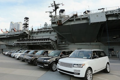 On April 14, ahead of the opening of the New York International Auto Show, Land Rover unveiled its latest concept vehicle to select journalists and brand dealers with a special event at the Intrepid Sea, Air & Space Museum. The evening affair was also used to announce a partnership with Virgin Galactic. Valet parking was provided for guests, and a fleet of current lineup Range Rovers shuttled guests to the venue.