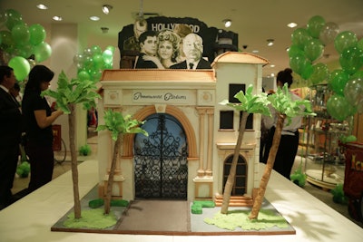 The Neiman Marcus event also included a cake inspired by the iconic entrance gate to Paramount Studios, complete with swaying palm trees, made by Christopher Garrens.