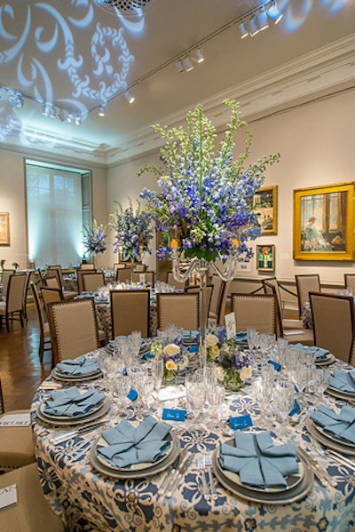 A few of the galleries took full advantage of the event theme using red, white, or blue—or a combination of two colors—almost exclusively. Each element, including flowers, linens, tables, and gobos, of one room remained white or blue.