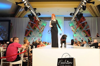 The fashion show had 46 models hit the runway with their four-legged friends. Tysons Galleria retailers provided clothing for the models, while Wagtime outfitted their companions with tutus, jackets, and bandanas.