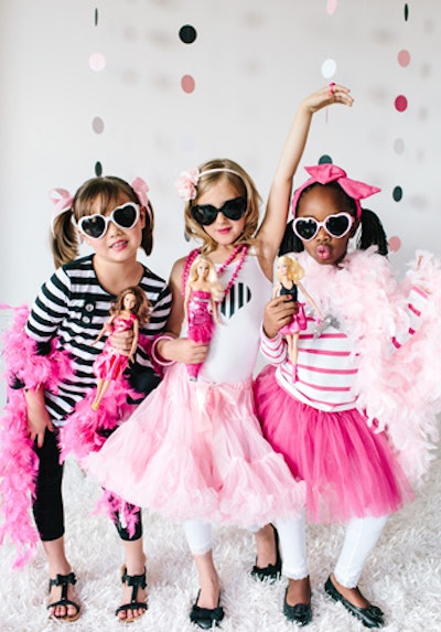 The birthday party event included a fashion show, after the young attendees got dolled up along with their dolls.