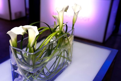 Jackie O. provided sleek, white floral arrangements that fit with the futuristic theme.