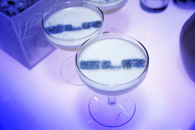 Candice & Alison worked with Charton Hobbs, the ambassador of Premium Brands alcohol, to create the evening's specialty drinks. One cocktail, served in a coupe glass, had the ELR logo in silver edible dust stencil.