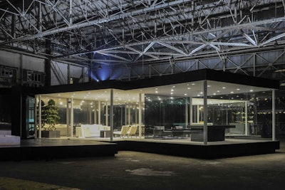 Set in a decommissioned hangar on the grounds of the former Kallang Airport (now an architectural landmark), the concept house was the focal point of an event hosted by Calvin Klein Inc. The brand tapped American architect Joshua Price-Ramus to build the one-of-a-kind architectural installation, which was erected solely for the one-night-only occasion.