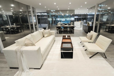 Products from the company's home furnishings line filled each of the living spaces. The concept house, which went through five iterations, took four weeks to plan and encouraged attendees to act as voyeurs as they peered inside.