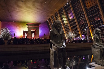 The Temple of Dendur exhibit, along with the adjacent Charles Engelhard Court, served as the setting for the party, which was lit by Bentley Meeker Lighting & Staging.