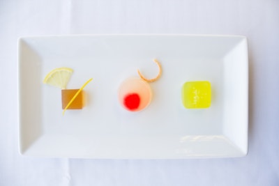 Boozy Jell-O shots: margarita; Tom Collins with a maraschino cherry and candied ginger; and John Daly, topped with lemon zest and slice, by Word of Mouth Catering in Austin, Texas