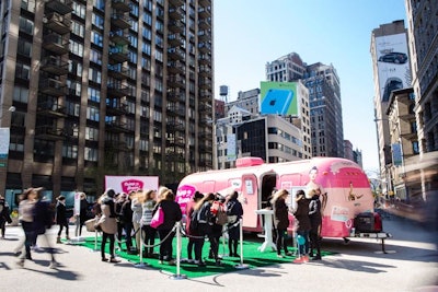 Women lined up outside Benefit's PrimpMobile near Madison Square Park in New York's Flatiron district for free brow services and makeup touch-ups.