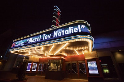 More and more families are choosing unexpected party venues: A bat mitzvah also designed by Danielle Couick of Magnolia Bluebird Design & Events was held at the AFI Silver, a movie theater in Silver Spring, Maryland. Film-theme details included a custom movie marquee.