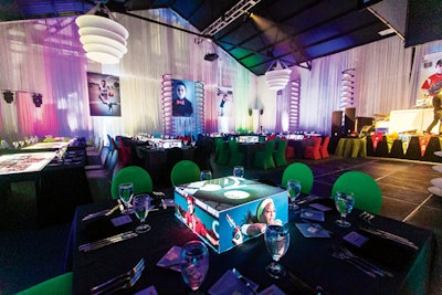 For a tailgate-party-theme bar mitzvah, Sara Renee Lowell of Sara Renee Events in South Florida and lighting company Designs by Sean created sleek cube-shaped photo centerpieces that were illuminated from within.