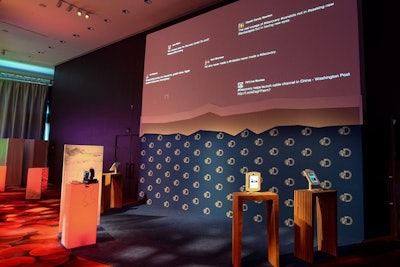 Tweets posted via iPads were immediately displayed on a Twitter wall; the area below the wall served as a step-and-repeat.