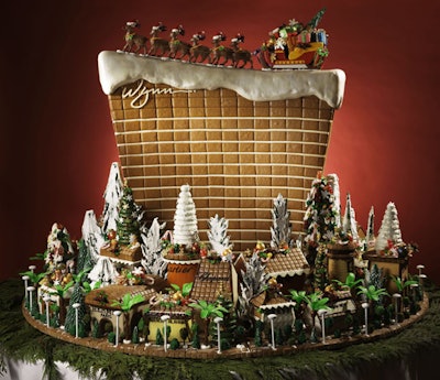 In December, Flora Aghababyan, chief cake designer for Wynn Las Vegas and Encore, created a three-foot gingerbread replica of the Wynn surrounded by the boutiques of Wynn and Encore Esplanades. The all-edible work was handcrafted from 4,500 gingerbread tiles, rolled fondant, and sugar. It weighed more than 295 pounds and took 21 days to construct, with turrets, façades, and towers all housing various Wynn and Encore retailers—like Chanel, Louis Vuitton, and Cartier—with their logos reproduced in sugar icing and fondant. The cake was on display at the property’s buffet throughout the holiday season.