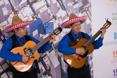 A mariachi duo serenaded the crowd with traditional Mexican tunes.