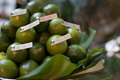 Here's a fun idea for escort cards: Debi Lilly pinned names and table numbers onto fresh limes.