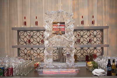 The vodka sponsor was promoted with a large ice sculpture at the bar.