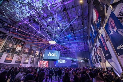 When the presentation finished, the audience of nearly 1,700 media buyers, ad executives, and press remained in the venue for the after-party. The chandelier's LED strips changed color, matching the hues of the lighting.