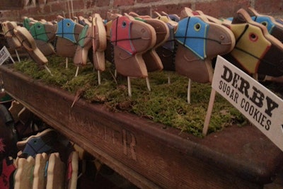 In addition to pies and cakes, Tipsy Parson's Derby Daze party offered sugar cookies decorated to look like race horses. The treats were served on sticks and presented on grassy trays.