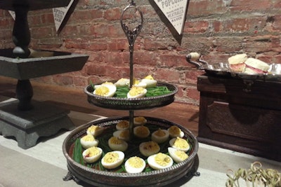 For more elegant finger foods, Tipsy Parson served deviled eggs on silver stands at its Derby Daze party last year.