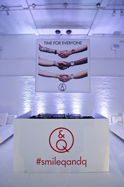 The DJ booth featured the event's hashtag and was arranged below a poster with the brand's new marketing slogan, 'Time for Everyone.'