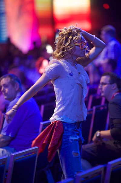 As attendees arrived for the opening keynote address from Cisco C.E.O. John Chambers, dancers dressed in edgy attire performed in the aisles as loud music played.