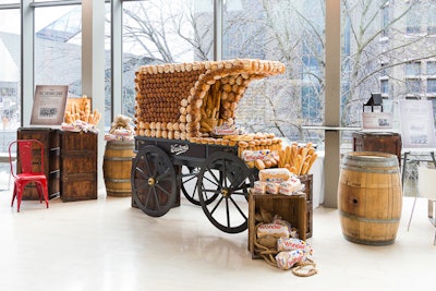 Decor also included a wagon made out of bread. It took 5th Element Events two days to build the structure, and the process involved shellacking real bread from Weston Foods and hot-gluing pieces to the wagon.