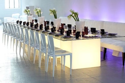Cube Tables paired with banquettes and Bellini chairs offer a sleek alternative to standard reception seating.