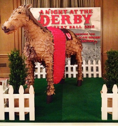 For the Kentucky Derby-theme American Heart Association's 2012 gala in Seattle, event designer Matthew Parker created a photo backdrop that included a life-size papier-mâché horse made from more than 5,000 individually placed construction-paper strips.