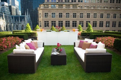Outdoor rattan furniture and glowing bars bring an elegant touch to cocktail hour.