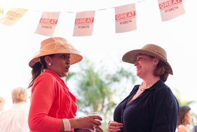 Guests were encouraged to wear garden party attire, which included many hats.