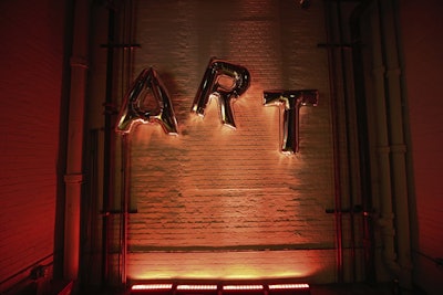 Silver mylar balloons were used as decor both nights, matching the Pop Art aesthetic of the first night and the more playful vibe of the second.