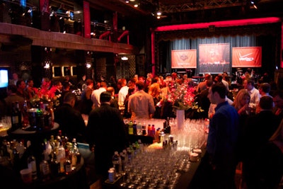 Verizon's Draft Eve party, held at the Edison Ballroom, featured the telecommunications company’s signature colors and signage throughout the venue, along with highboy tables doubling as charging kiosks.