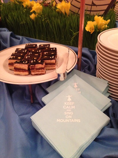 Light blue cocktail napkins were customized with the silhouette of a twirling nun and the caption: 'Keep calm and sing on mountains.'