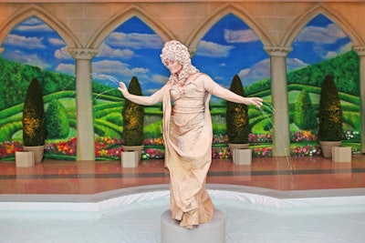During the cocktail party prior to dinner, a dramatic living statue posed on a pedestal. The party was inspired by the Getty Villa, itself a replica of an estate near Pompeii from circa A.D. 79.