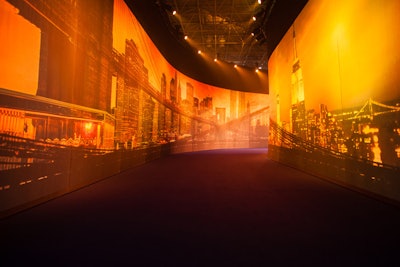 Screens printed with the New York City skyline enclosed the entry hallway that led to the reception space.