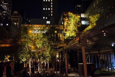 Graphic projections by Bentley Meeker Lighting & Staging illuminated the garden for the after-party.