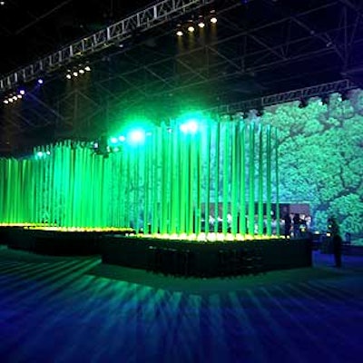 Adler created four large tables, each topped with 81 green poles that rose almost 20 feet in a grid pattern.