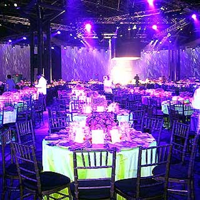 At the Robin Hood Foundation's benefit at the Javits Center, designers Avi Adler and David Stark used fluorescent colors and black lighting to conjure a deep sea dining room. White muslin surrounding the dining area served as projection screens.