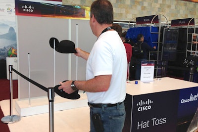 To celebrate the hat as an iconic element of Cisco Live, organizers created a hat-toss game next to the conference store. Those who successfully tossed a hat onto one of the poles won a $5 gift card to the store.