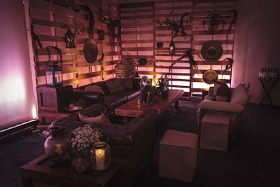 Event Creative placed lounge areas throughout the space that had props inspired by the Old West.