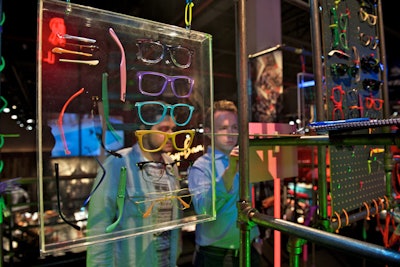 The upstairs area featured the Ray-Ban Remix station, where custom-built kiosks allowed guests to customize pairs of Ray-Bans as gifts. With the process entirely digital, glasses were immediately expedited and mailed to guests a few days after the event. The station itself was welded on-site.