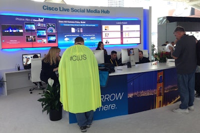 Cisco Live's social media staff tracked Twitter traffic and awarded the yellow #CLUS cape each day to the person who posted the most tweets the day before.