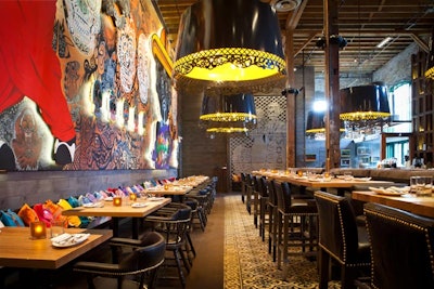 Located in the historic Distillery District, El Catrin Destileria serves both traditional and modern Mexican cuisine in a vibrant setting. A semiprivate dining room called La Bodega seats 30 guests in a main-floor space that features a 25-foot hand-painted wall with skulls from Mexico and a glass-encased ritual Dia de los Muertos altar. El Balcone, the chef's table, accommodates 18 guests with a harvest table on a floating balcony, giving guests a bird's-eye view of the entire restaurant.